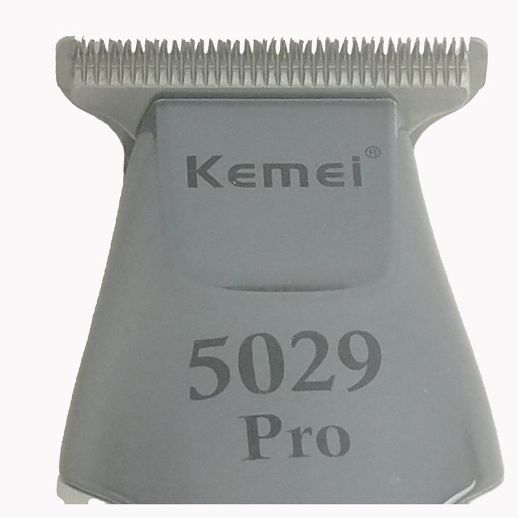 ماشین اصلاح موی سر و صورت کیمی مدل KM-5029 Pro با تیغه تیتانیوم پیشرفته، قابلیت تنظیم سرعت، نمایش وضعیت باتری، طراحی ارگونومیک، اصلاح خط زن با اندازه اصلاح 0.1 میلیمتر، منبع انرژی برق و باتری، وزن 200 گرم، مدت زمان استفاده 240 دقیقه پس از شارژ کامل
