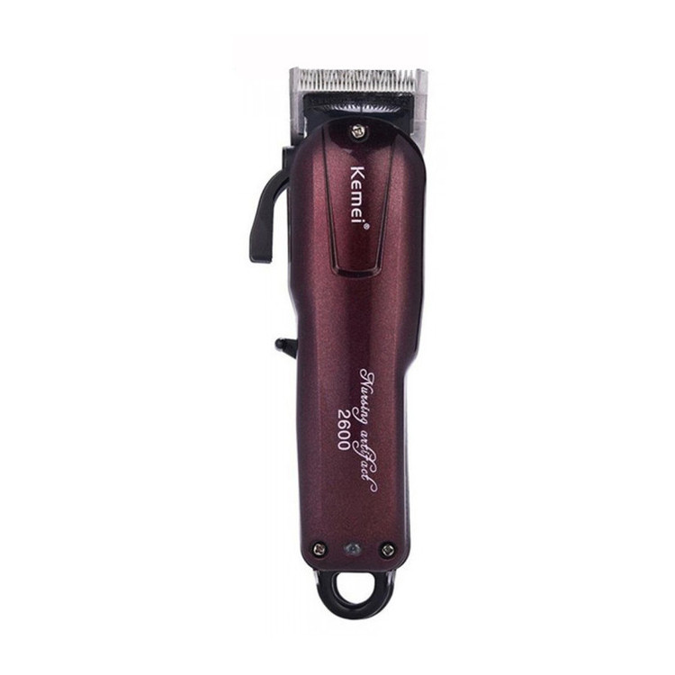 ماشین اصلاح موی صورت کیمی مدل KM-2600 با تیغه استیل ضد زنگ، برش مستقیم، قابلیت تنظیم سرعت، اندازه اصلاح 0.5 تا 2.5 میلیمتر، همراه با 4 عدد شانه و باتری شارژی با مدت استفاده 120 دقیقه