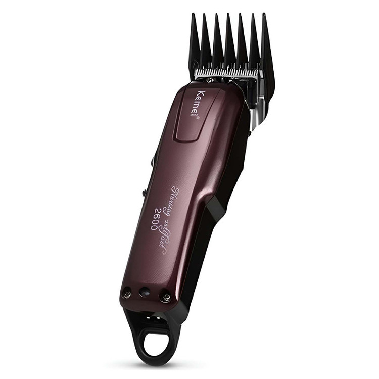 ماشین اصلاح موی صورت کیمی مدل KM-2600 با تیغه استیل ضد زنگ، برش مستقیم، قابلیت تنظیم سرعت، اندازه اصلاح 0.5 تا 2.5 میلیمتر، همراه با 4 عدد شانه و باتری شارژی با مدت استفاده 120 دقیقه