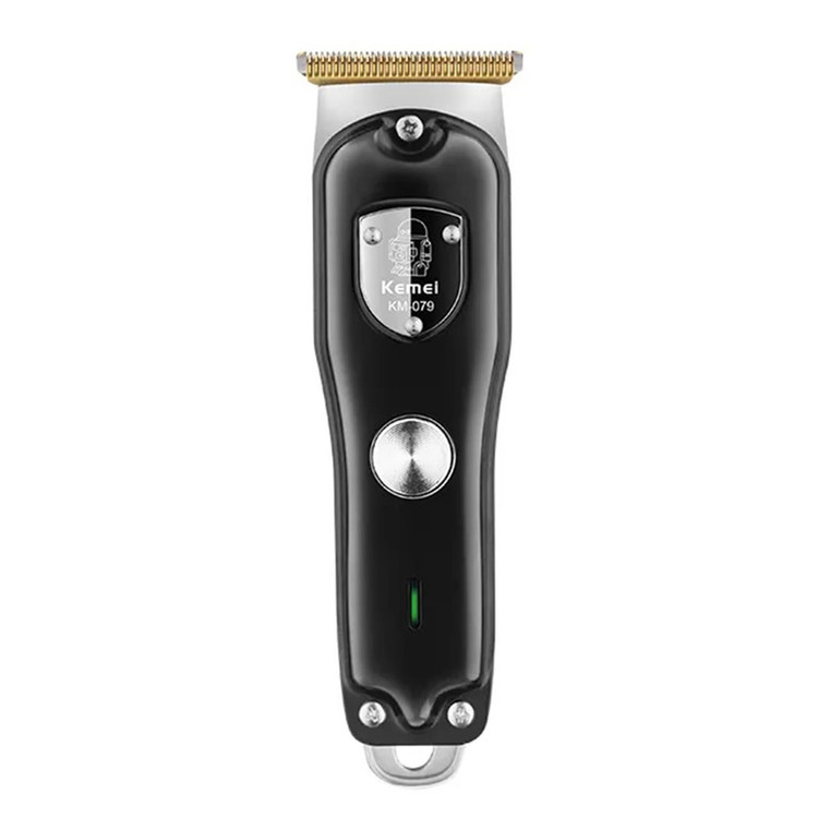 ماشین اصلاح موی صورت کیمی مدل KM-079 با تیغه کربن استیل، باتری 600 میلیآمپر، 4 شانه تنظیم طول 1 تا 4 میلیمتر، استفاده خشک و مرطوب و شارژدهی 100 دقیقه