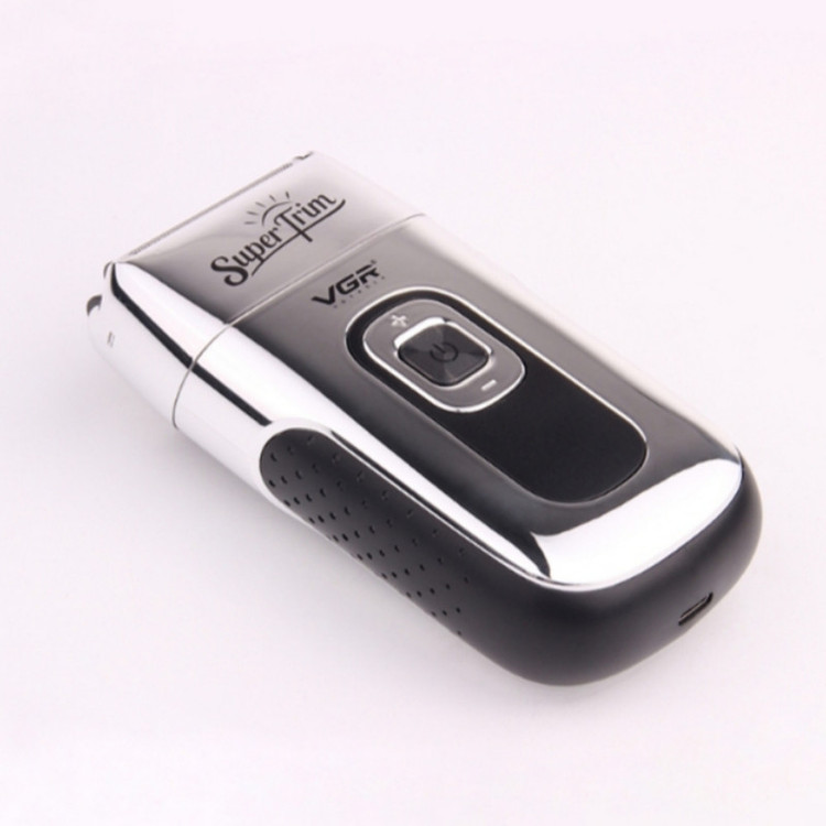 ماشین اصلاح موی صورت وی جی ار مدل V_332 با تکنولوژی برش چرخشی، باتری قابل شارژ 600mAh، قابلیت اصلاح با شماره صفر، تیغه استیل ضدزنگ و برس تمیزکننده همراه