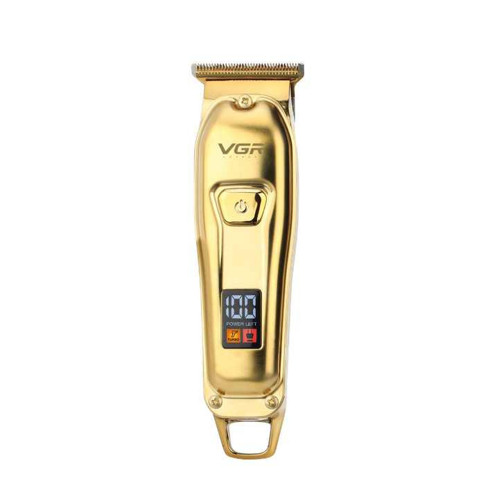 ماشین اصلاح موی سر و صورت وی جی آر مدل V-965 با تیغه استیل ضد زنگ، قابلیت اصلاح با شماره صفر، تنظیم سرعت، شانه قابل تنظیم و باتری 600 میلیآمپر ساعت با شارژ USB و طراحی ارگونومیک و مقاوم در برابر لغزش