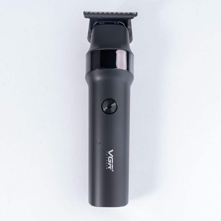 ماشین اصلاح موی سر و صورت وی جی آر مدل V-987 با تیغه سرامیکی و استیل ضد زنگ، موتور دی سی 7000 دور در دقیقه، عملکرد توربو، باتری 2000 میلیآمپرساعتی با 400 دقیقه استفاده و صفحه نمایش الایدی میزان شارژ