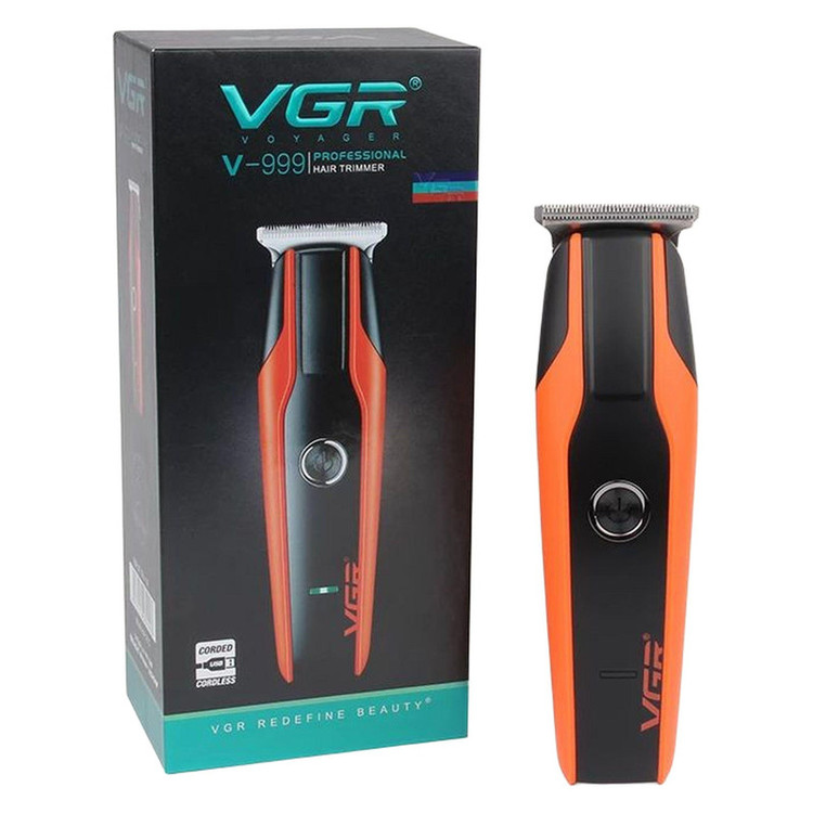 ماشین اصلاح موی سر و صورت وی جی آر مدل V-999 با تیغه استیل پیشرفته، اصلاح دقیق 0.01 میلیمتر، استفاده خشک و مرطوب، باتری شارژی 90 دقیقه کارکرد و 4 شانه تنظیم طول