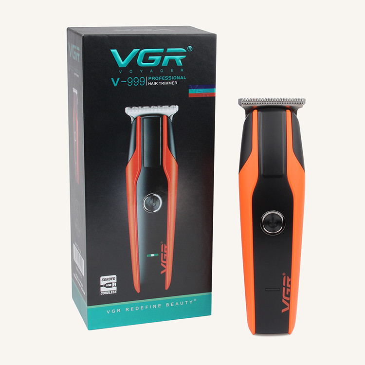 ماشین اصلاح موی سر و صورت وی جی آر مدل V-999 با تیغه استیل پیشرفته، اصلاح دقیق 0.01 میلیمتر، استفاده خشک و مرطوب، باتری شارژی 90 دقیقه کارکرد و 4 شانه تنظیم طول