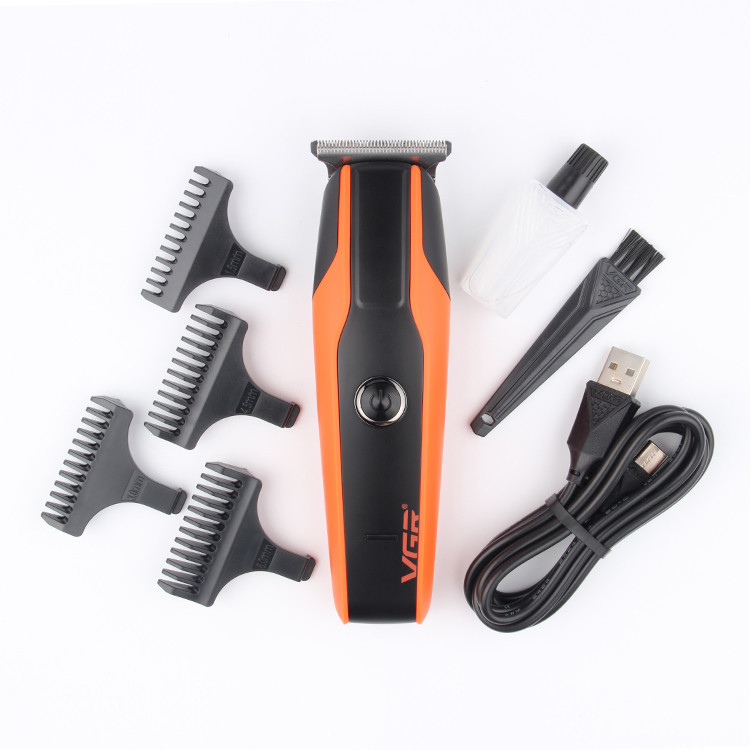ماشین اصلاح موی سر و صورت وی جی آر مدل V-999 با تیغه استیل پیشرفته، اصلاح دقیق 0.01 میلیمتر، استفاده خشک و مرطوب، باتری شارژی 90 دقیقه کارکرد و 4 شانه تنظیم طول